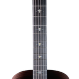 Close-up of a guitar neck with fret markers on a white background
