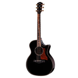 Black acoustic guitar on a white background