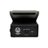 A Walrus Audio Expresion guitar pedal open lid, showing the rear panel with USB-C port, 9VDC 300mA power jack, and white Walrus Audio logo on a black casing.