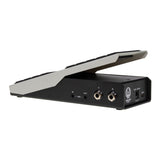 A Walrus Audio Expresion guitar pedal electronic foot pedal with multiple audio input and output jacks, shown from a side angle on a white background.