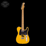 Yellow electric guitar on a black background with 'Tone Shop' logo.