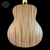 Back view of a guitar with a visible brand logo in the corner.