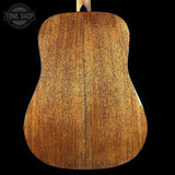 Back view of a wooden acoustic guitar with 'Tone Shop' branding.