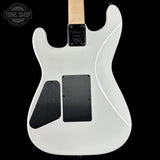 White electric guitar body with black pickups on a black background, featuring 'Tone Shop' logo.