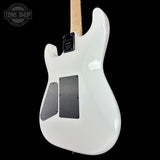 White electric guitar body with a clear finish on a black background, featuring the Tone Shop logo.