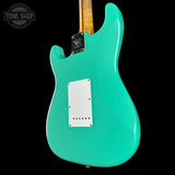Back angle of Fender Custom Shop 70th Anniversary 1954 Stratocaster Journeyman Relic Seafoam Green.