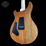 Back angle of PRS Wood Library Custom 24 Quilt 10 Top Natural.