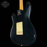 Back angle of Fender Custom Shop Limited Edition Roasted '54 Strat Journeyman Relic Aged Black.