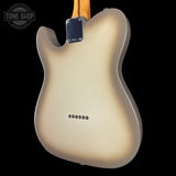 Back of a guitar with 'Tone Shop' logo in the corner