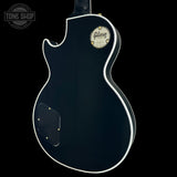 Gibson electric guitar body with brand logo on a black background