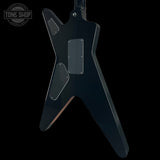Black electric guitar body on a black background with 'Tone Shop' logo.