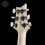 Back of headstock of PRS Wood Library Custom 24 Quilt 10 Top Natural.