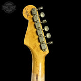 Guitar headstock with tuning pegs on a black background, featuring 'Tone Shop' logo.