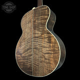 Back angle of Collings SJ Custom Jet Black Top Tigerstripe Pickguard Old Growth Sitka/Bastogne Walnut.