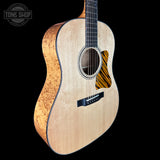Front angle of Collings CJ Old Growth Sitka Baked Bubble Maple.