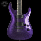 Purple glitter electric guitar on a black background with 'Tone Shop' logo.