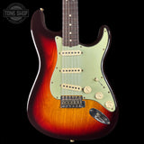 Electric guitar with a sunburst finish on a black background, featuring the Tone Shop logo.