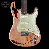 Custom electric guitar with a unique design on a black background, featuring the Tone Shop logo.