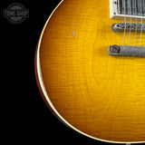 Front angle of Gibson Custom Shop 1959 Les Paul Standard Reissue Murphy Lab Heavy Aged Golden Poppy Burst.
