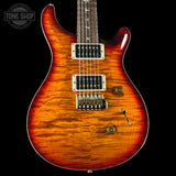 Front angle of PRS Wood Library Custom 24 Quilt 10 Top Dark Cherry Sunburst.