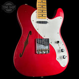 Front angle of Fender Custom Shop 50S Thineline Telecaster Journeyman Relic Aged Candy Apple Red.