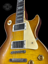 Front angle of Gibson Custom Shop 1959 Les Paul Standard Reissue Murphy Lab Heavy Aged Golden Poppy Burst.