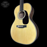 Front angle of Martin Custom Shop 00 28 Style Adirondack / Exceptionally Figured Black Walnut.