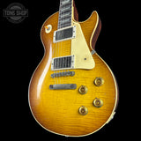 Front angle of Gibson Custom Shop 1959 Les Paul Standard Reissue Murphy Lab Heavy Aged Golden Poppy Burst.