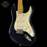 Front angle of Fender Custom Shop Limited Edition Roasted '54 Strat Journeyman Relic Aged Black.