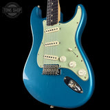 Front angle of Fender Custom Shop 1963 Stratocaster Journeyman Relic Ocean Turquoise AAA Maple Neck.