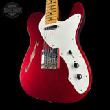 Front angle of Fender Custom Shop 50S Thineline Telecaster Journeyman Relic Aged Candy Apple Red.