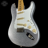 Front angle of Fender Custom Shop 1969 Stratocaster Journeyman Relic Silver Sparkle.