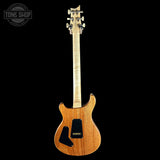 Full back of PRS Wood Library Custom 24 Quilt 10 Top Natural.