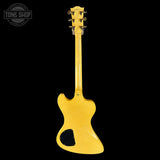 Yellow electric guitar on a black background with 'Tone Shop' logo.