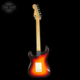 Electric guitar with a sunburst finish on a black background, featuring the Tone Shop logo.