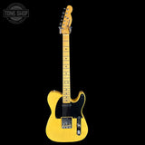 Yellow electric guitar on a black background with 'Tone Shop' logo.