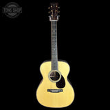 Full front of Martin Custom Shop OM 42 Style Adirondack/Wild Grain East Indian Rosewood.