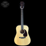 Acoustic guitar on a black background with 'Tone Shop' logo.
