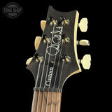 Headstock of PRS Wood Library Custom 24 Quilt 10 Top Natural.