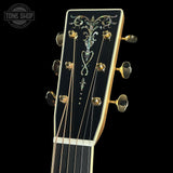 Headstock of Martin Custom Shop Dread 14-Fret Quilted Maple.