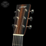 Guitar headstock with 'Collings' branding on a black background