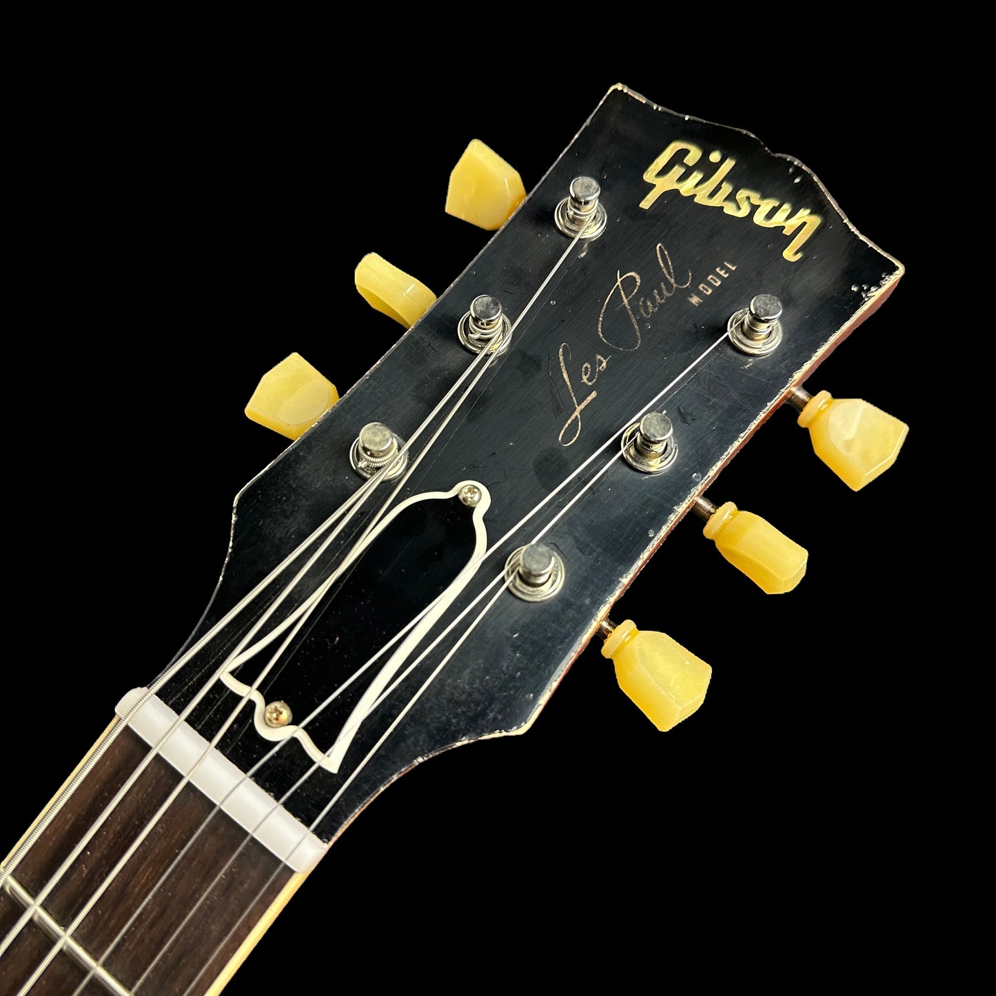 Close up of Gibson Custom Shop Murphy Lab 1959 Les Paul Standard Heavy Aged Green Lemon Fade headstock.