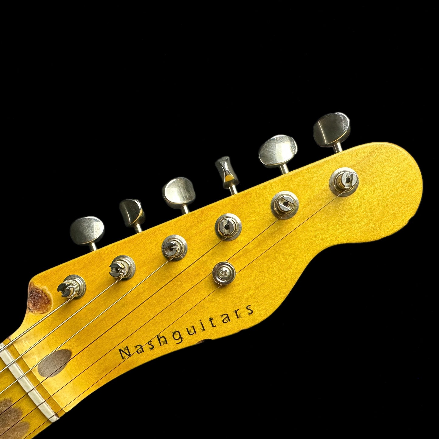 Close up of Nash T-52 Butterscotch Blonde Heavy Aging TSG233 6lbs 12oz headstock.