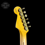 Back of headstock of Fender Custom Shop Time Machine '57 Strat Heavy Relic Aged Fiesta Red.