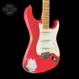 Front angle of Fender Custom Shop Time Machine '57 Strat Heavy Relic Aged Fiesta Red.