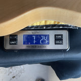 Used 2024 Squier Classic Vibe '70's Telecaster Thinline Natural on scale displaying weight.