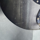 Finish wear on the body of Used Sterling by Music Man Sting Ray Bass Satin Black.
