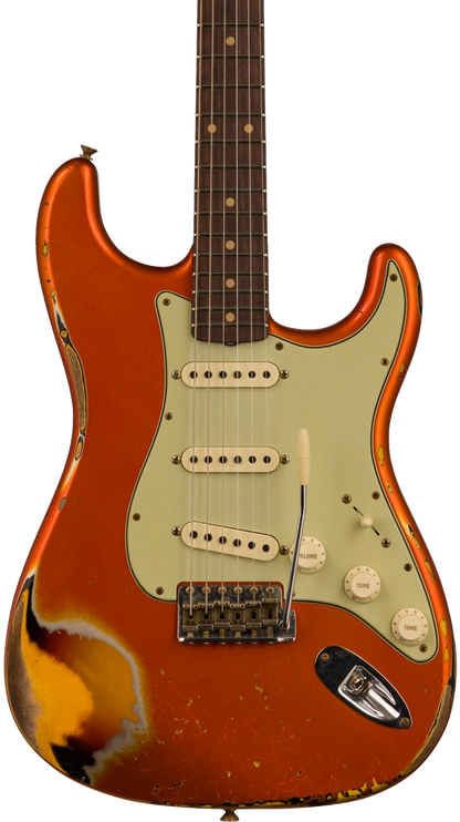 Front of body of Fender Custom Shop Limited Edition 62 Strat Heavy Relic Aged Candy Tangerine Over 3 Color Sunburst.