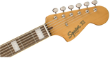 Close up of Squier Classic Vibe Bass VI Black headstock.