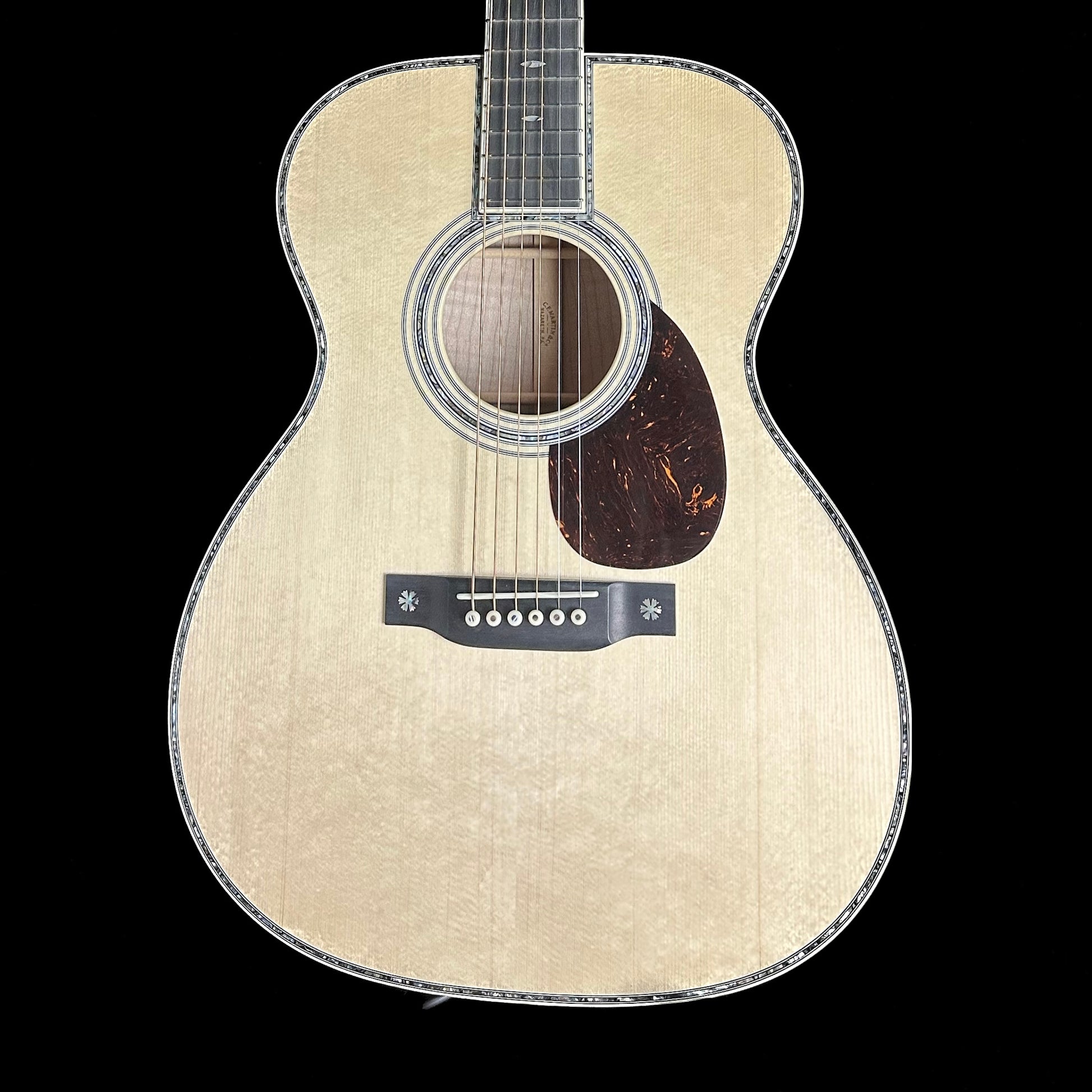 Front of Martin Custom Shop 42 Style OM Adirondack/Pacific Big Leaf Flamed Maple.